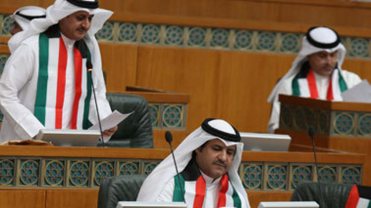 Kuwait says in `state of war with militants, more detained