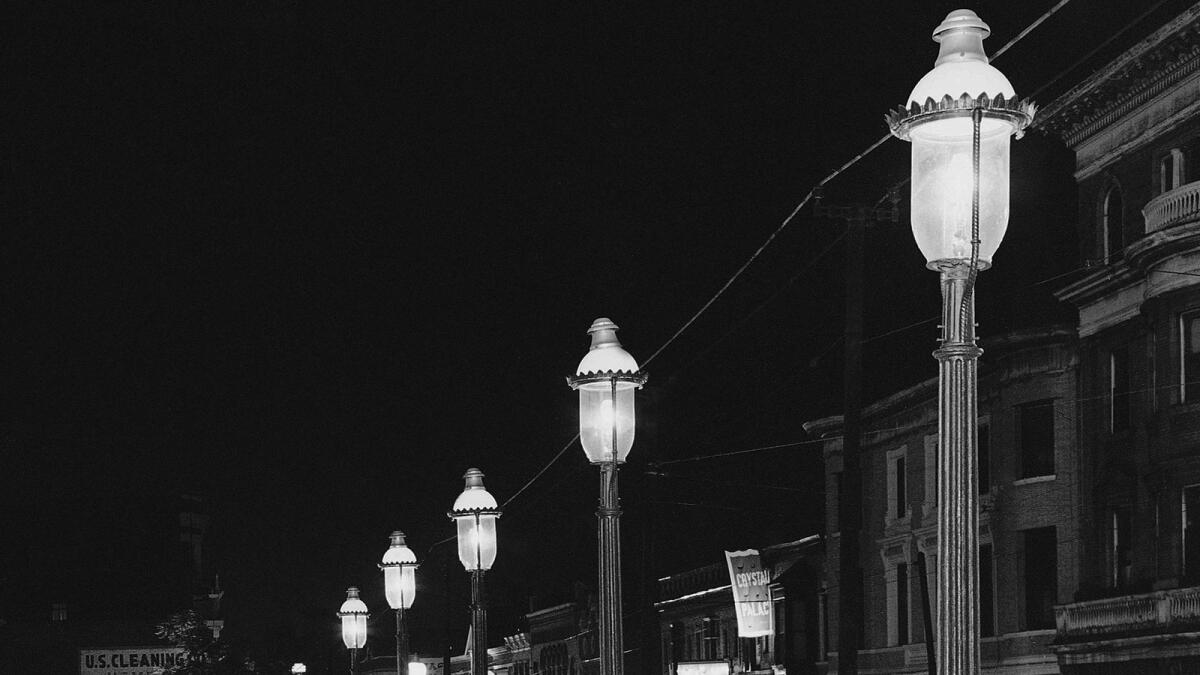 Gas lamps illuminate St. Louis' Gaslight Square on April 2, 1962. 'Gaslighting' — mind manipulating, grossly misleading, downright deceitful — is Merriam-Webster's word of 2022. (Photo: AP)