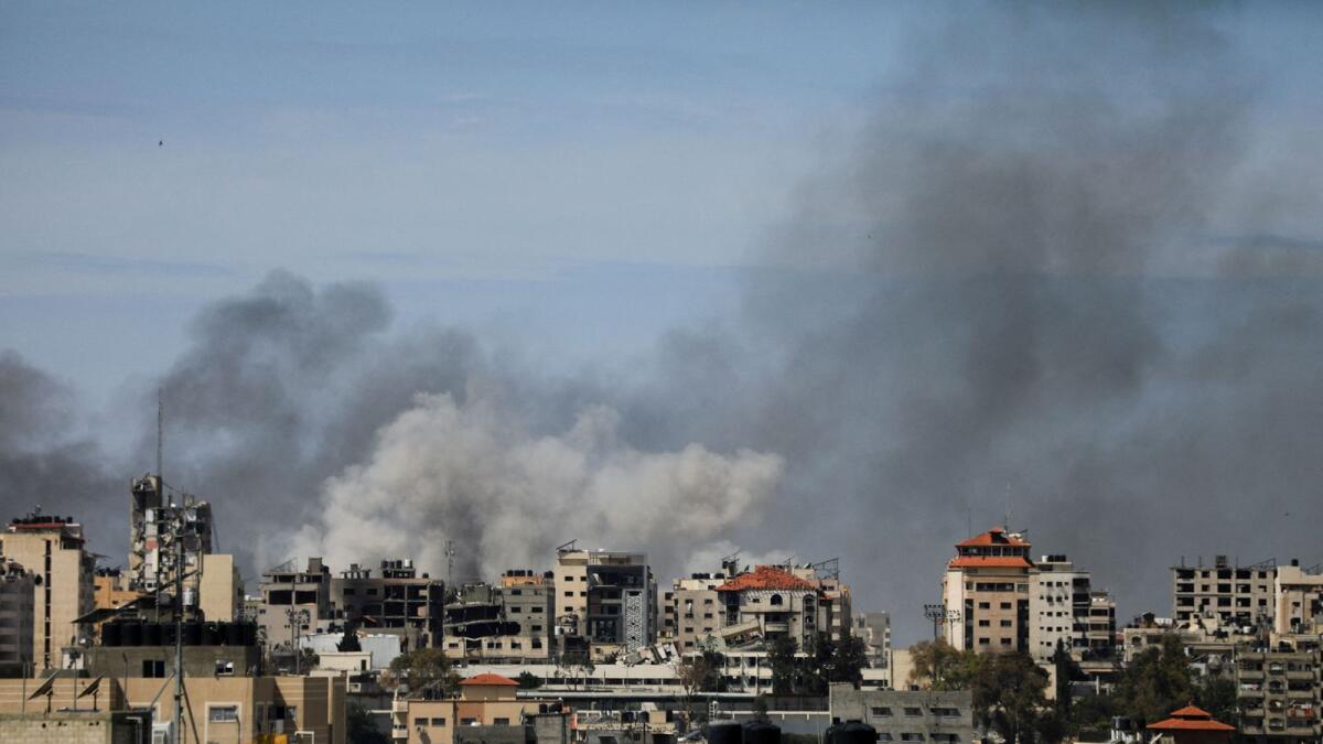 Smoke rises during an Israeli raid at Al Shifa hospital and the area around it. — Reuters