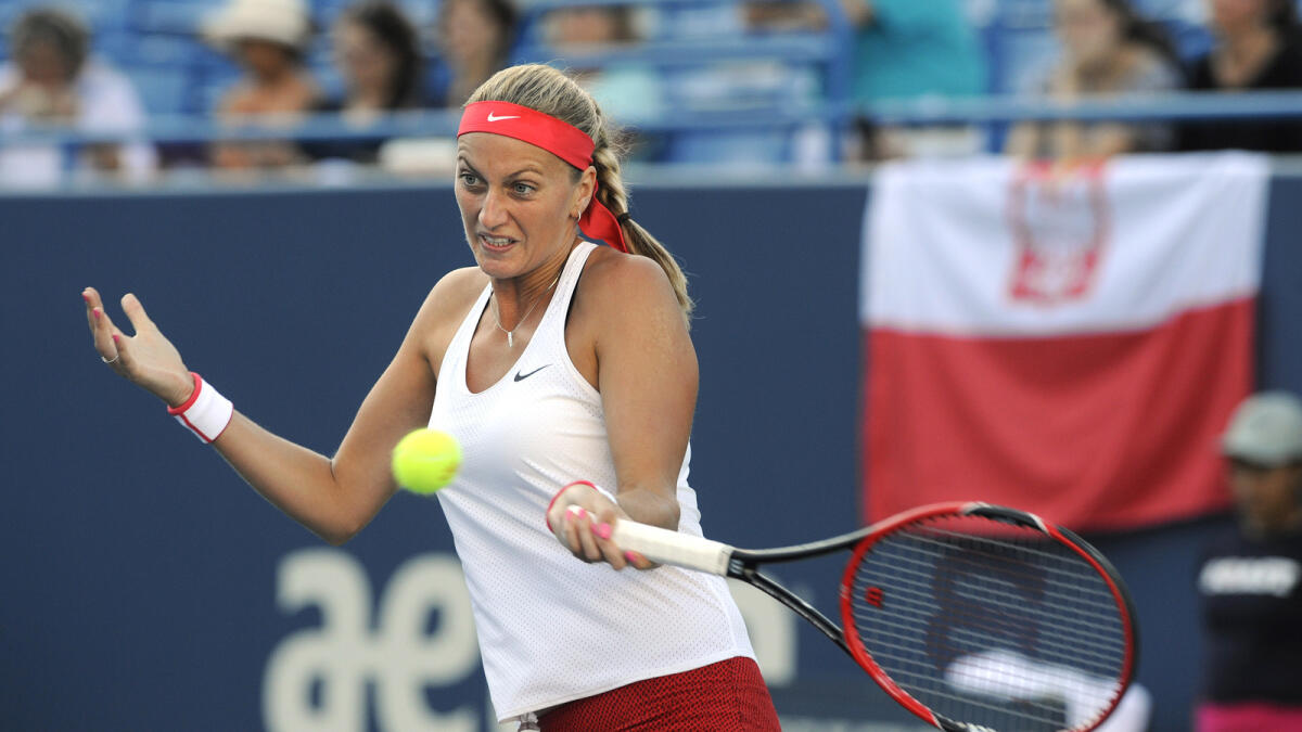 Petra Kvitova hits a forehand during her match against Agnieszka Radwanska. 