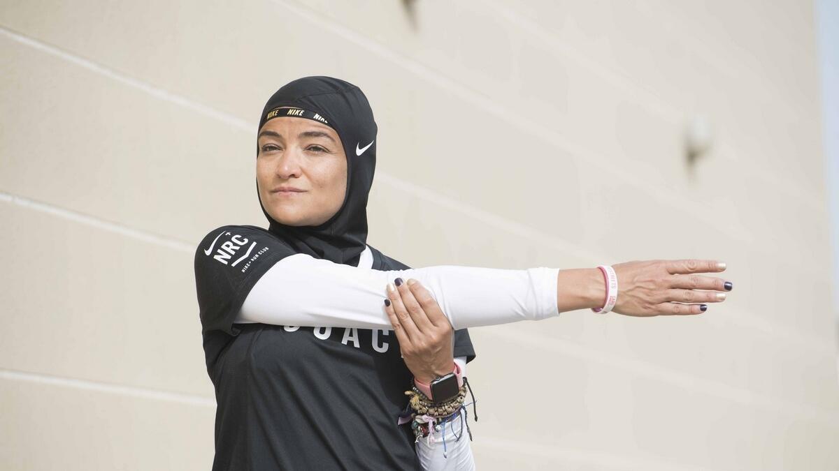 Manal Rostom, Dubai Fitness Challenge, Apple Watch UAE personal trainer hijab 