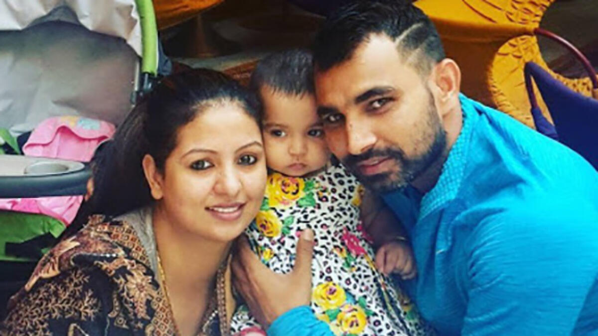 Mohammed Shami with his daughter Aira and estranged wife Hasin Jahan. -- File photo