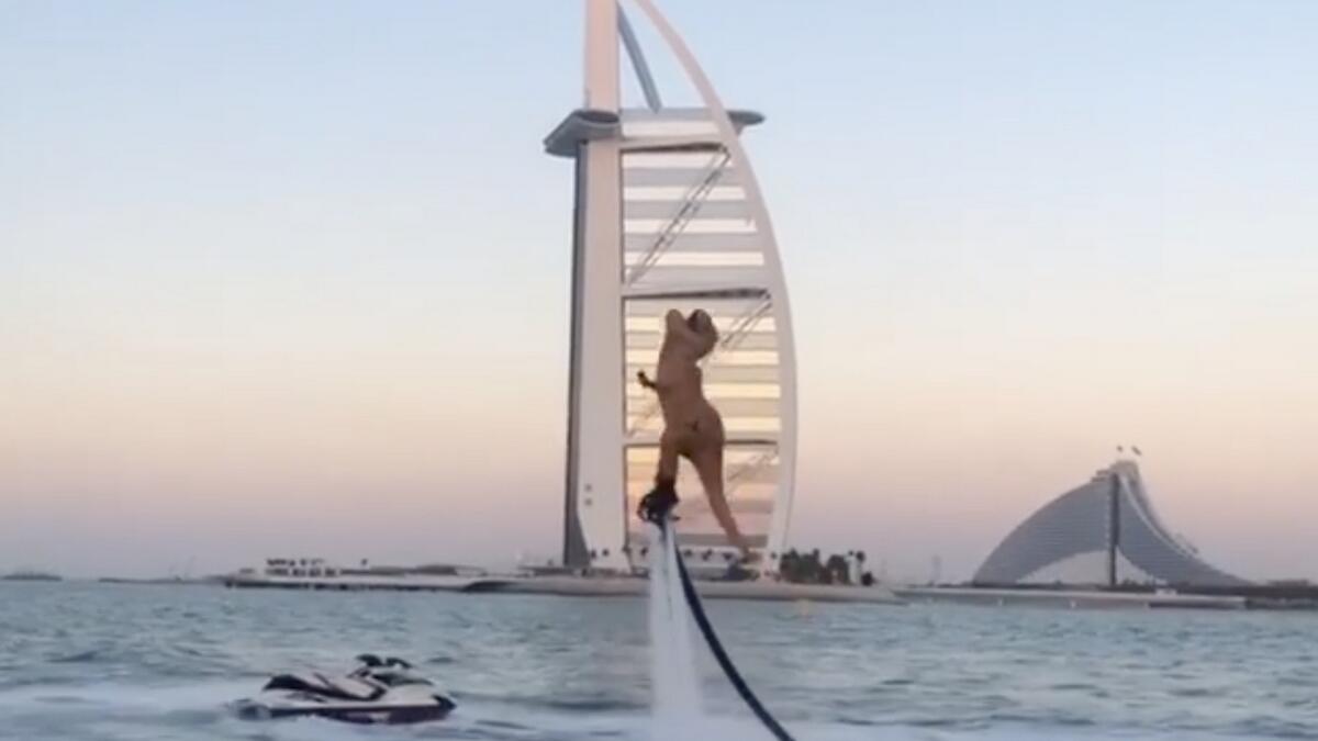 Video: Have you seen this dinosaur flyboarding near Dubais Burj Al Arab?