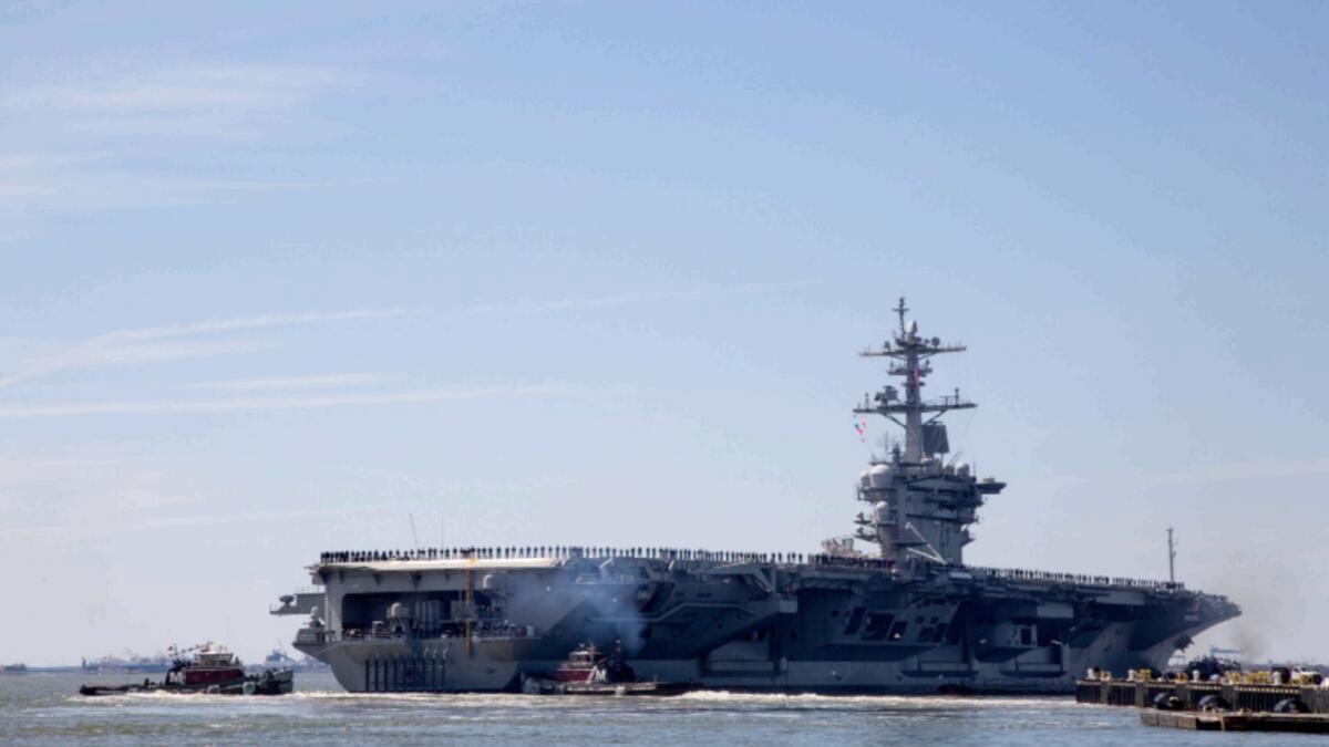 USS Abraham Lincoln aircraft carrier, where the MH-60S helicopter was operating on the deck before the crash. — AP file