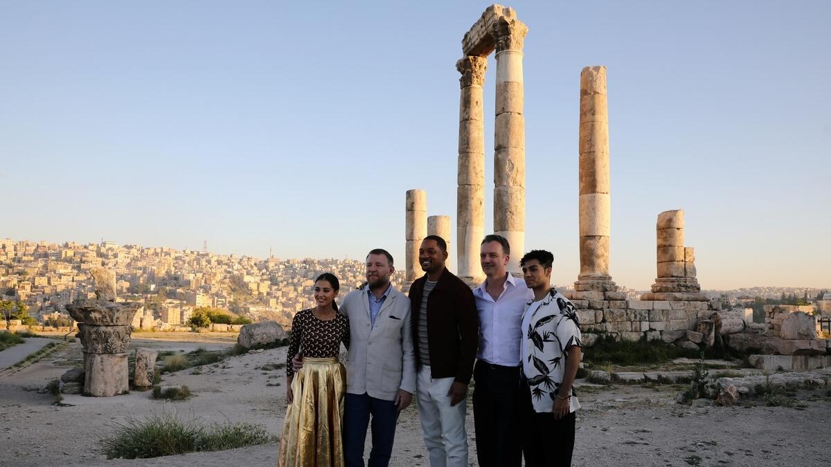 Cast members of Disney's live-action 'Aladdin' pose during their visit at the Amman Citadel, an ancient Roman landmark in Amman, Jordan. Reuters