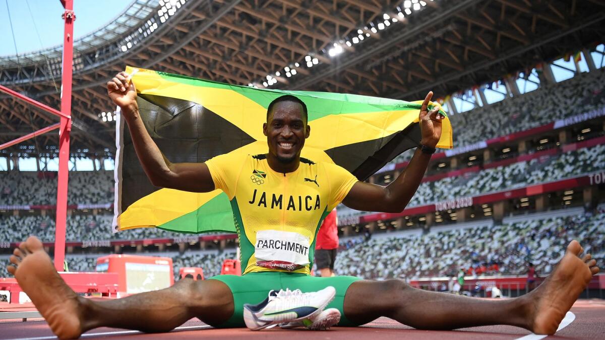 Jamaica's Hansle Parchment poses after winning  the men's 110m hurdles final. (AFP)