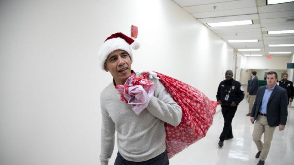 Video: Obama fills in for Santa, makes surprise visit to children’s hospital