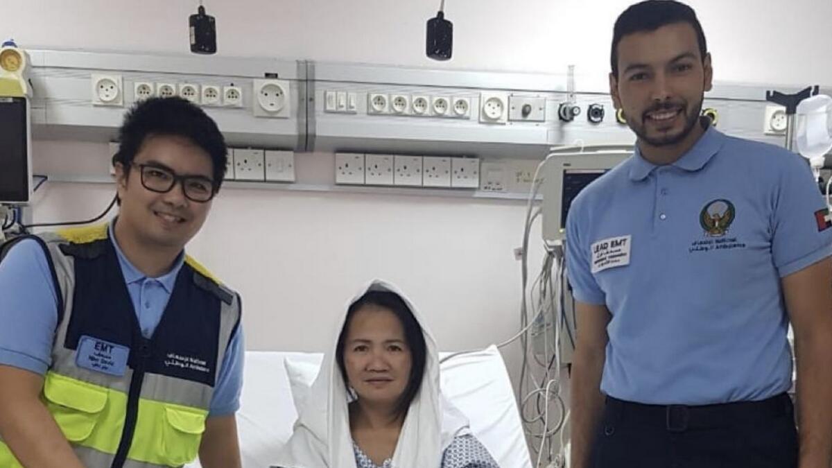 Filipina, woman, saved, near death, uae, paramedics, national ambulance