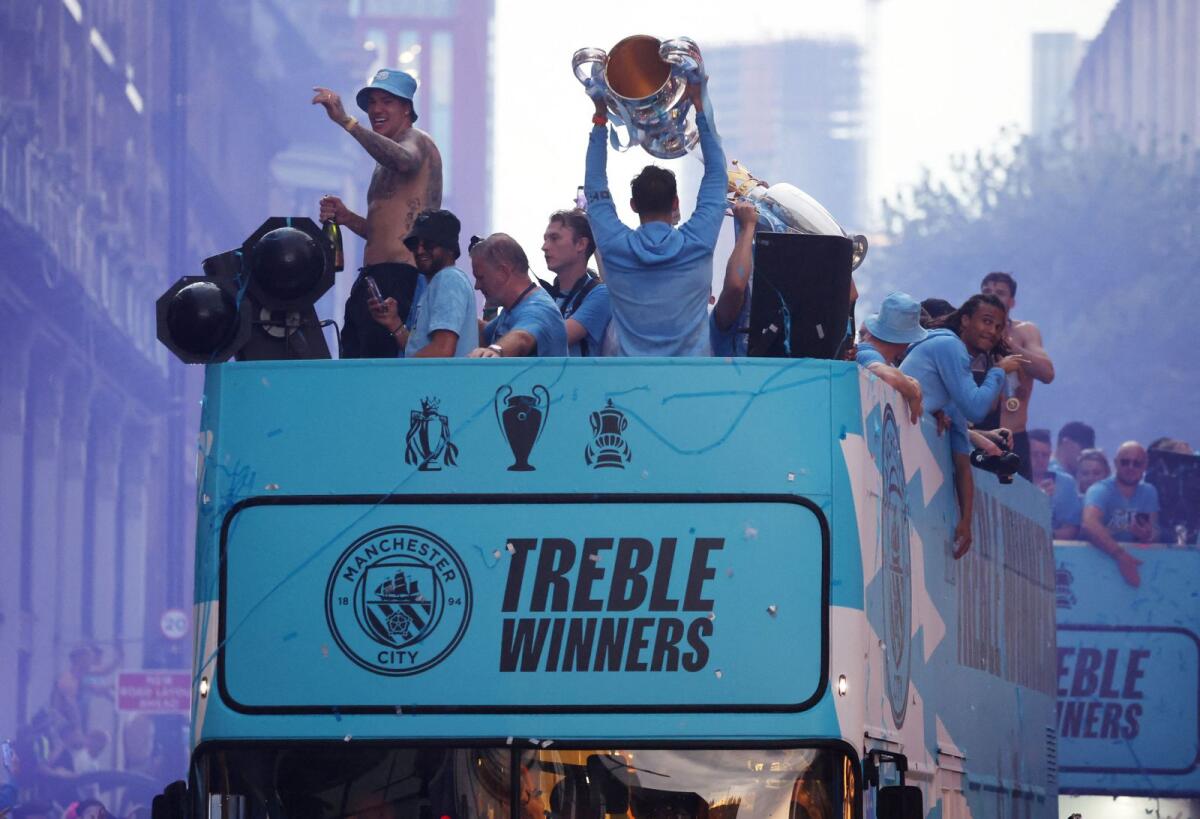 Manchester City players during the victory parade on Monday. — Reuters