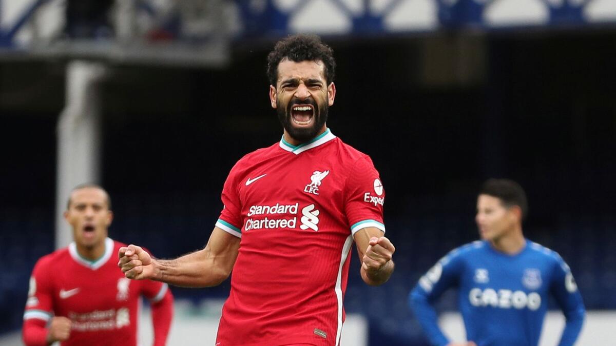 Liverpool's Mohamed Salah celebrates his goal against Fulham during the English Premier League match. — AP