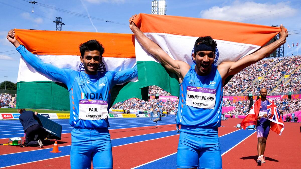 India's Eldhose Paul (left) and Abdulla Aboobacker celebrate after the men's triple jump final on Sunday. — AP