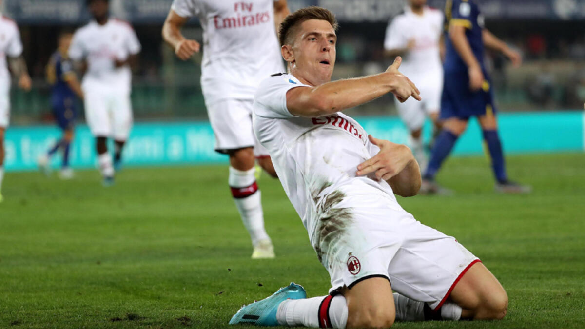 Piatek winner helps AC Milan pip 10-man Verona