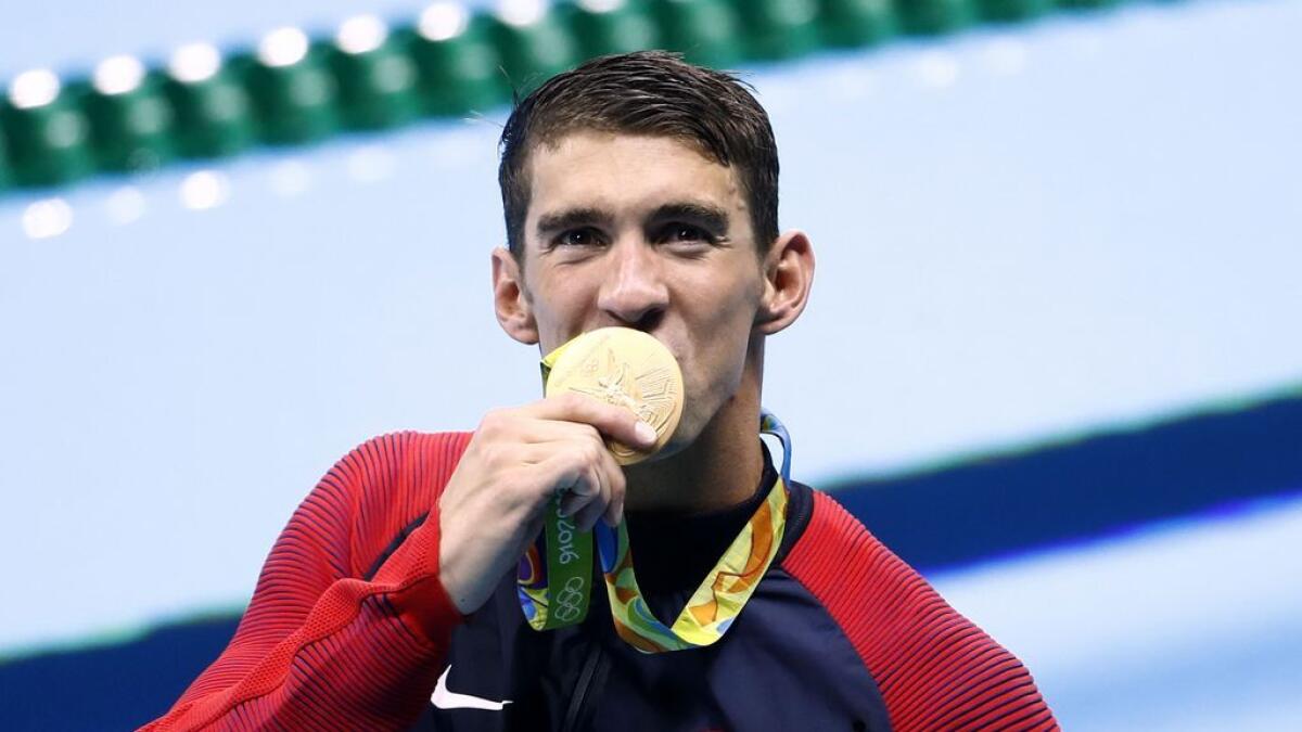 Phelps wins Olympic gold medals 20 and 21 in Rio