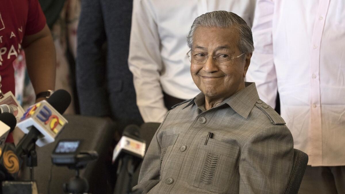 Mahathir Mohamad smiles during a press conference in Kuala Lumpur, Malaysia.-AP 