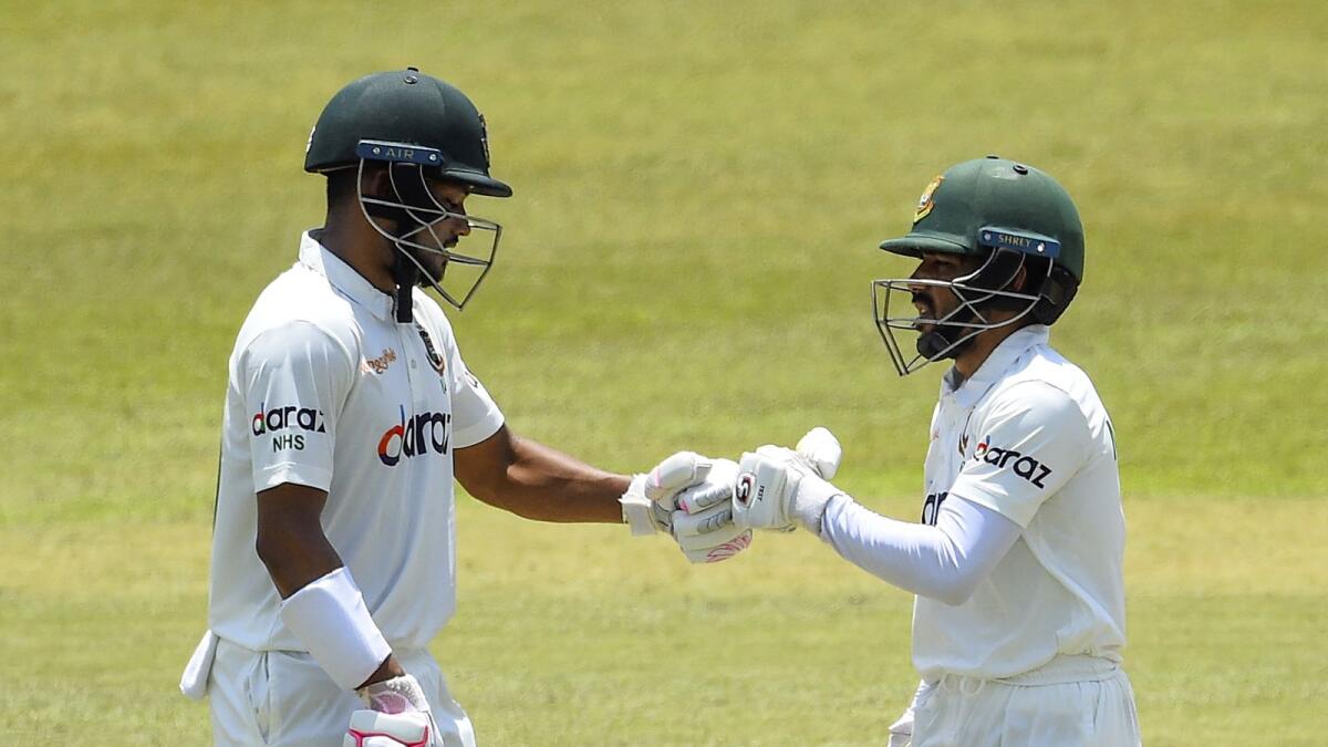 Bangladesh's Najmul Hossain Shanto with teammate Mominul Haque during their partnership. (AFP)