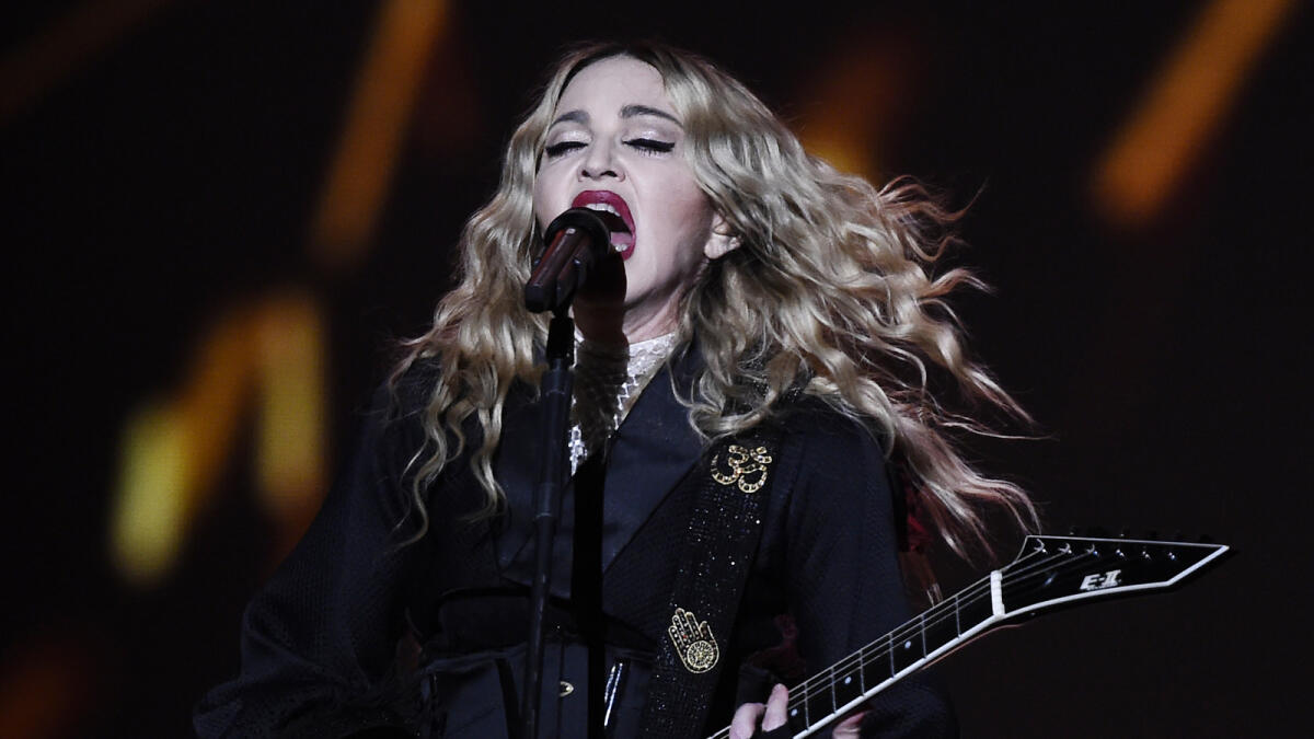 Madonna breaks down on stage, slams terrorists, pays tribute to Paris victims