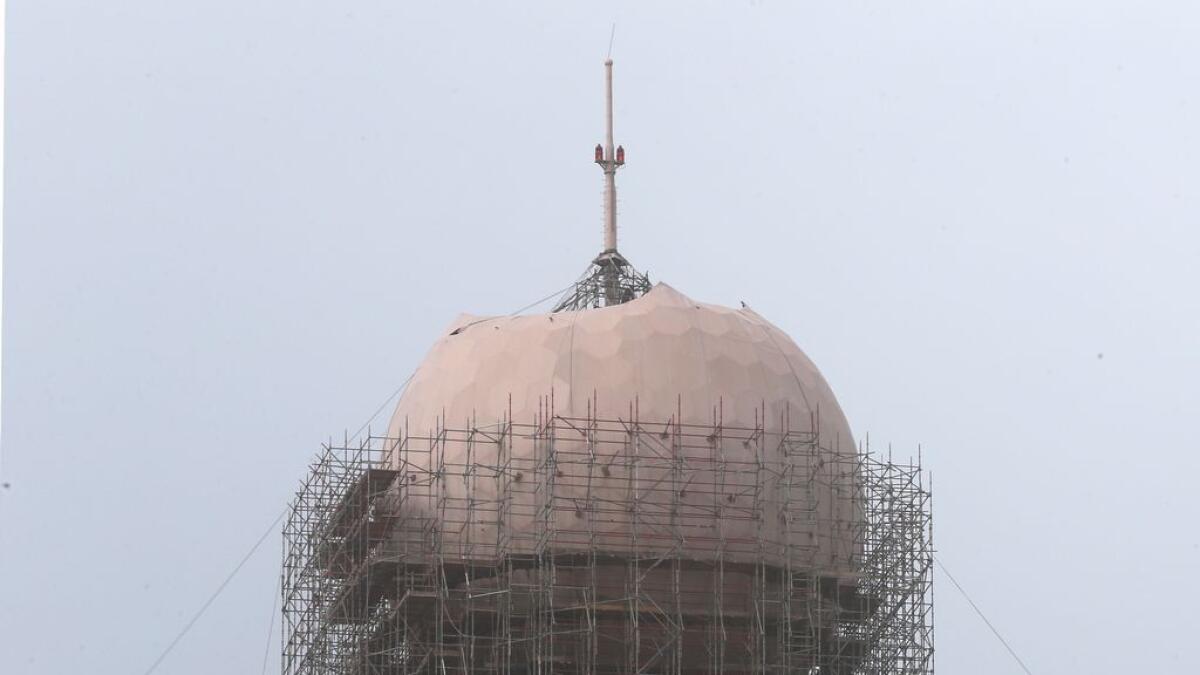 The removal process of the iconic ‘golf ball’ which sat on top of the Etisalat Building in Abu Dhabi.- Photo by Ryan Lim/Khaleej Times