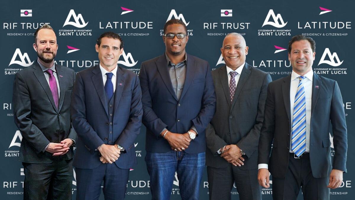 (L-R) Jon Green, director of global sales; David Regueiro, group COO; MC Claude Emmanuel, CEO of the Citizenship by Investment Unit; Dr Ernest Hilaire,Deputy Prime Minister, St Lucia; Mimoun Assraoui, CEO, RIF Trust and vice-chairman of Latitude Group.