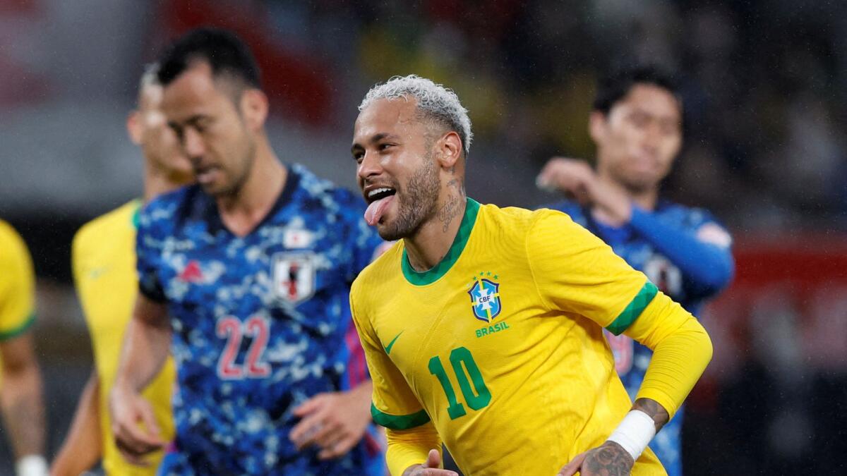 Neymar celebrates his goal during the match against Japan. (Reuters)