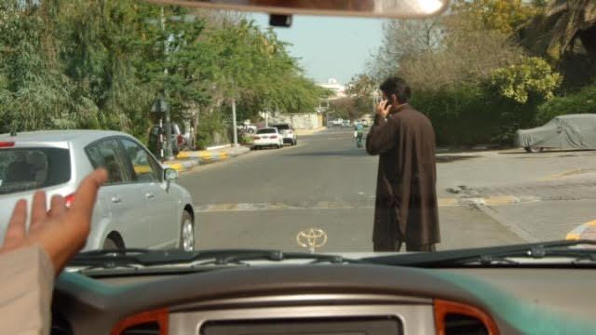 Dont use phone while crossing roads: Abu Dhabi Police
