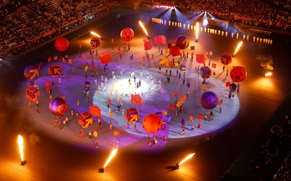 General view of performers during the closing ceremony before the match. Photo: AFP