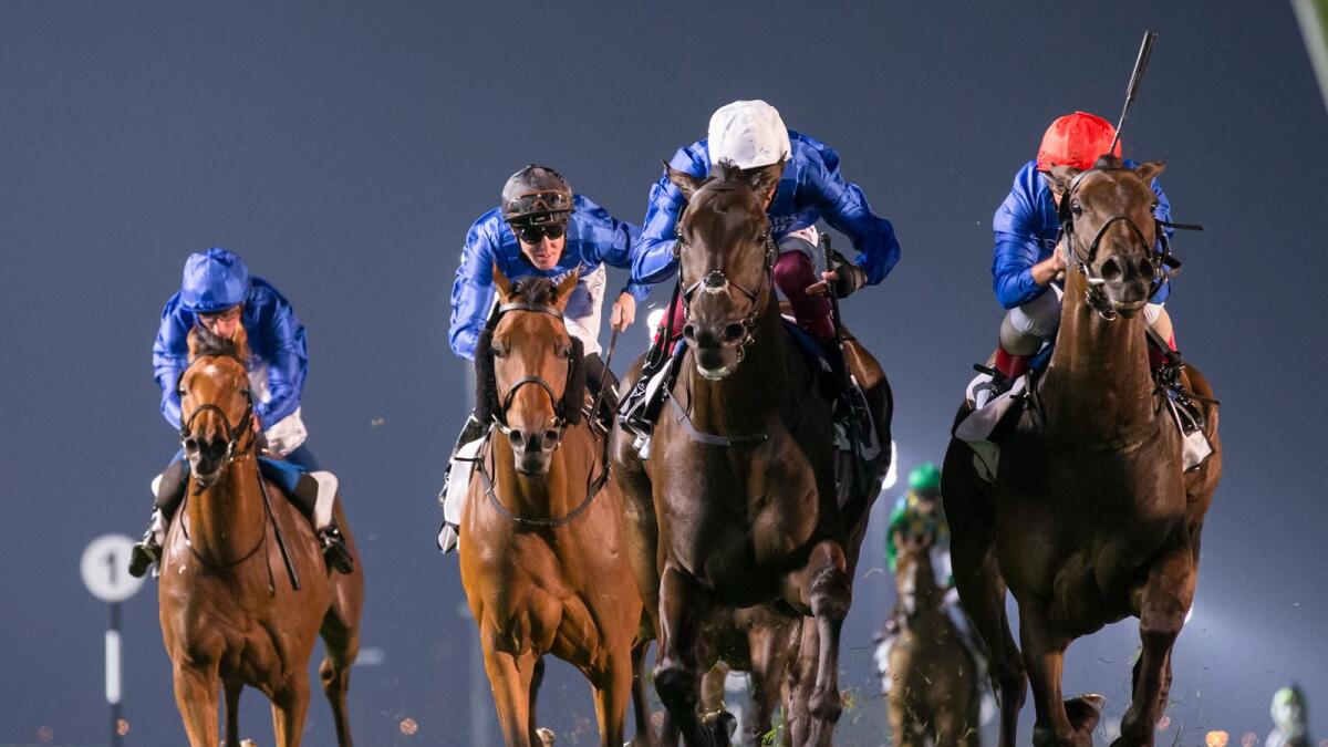 Frankie Dettori (left) rides the Saeed bin Suroor-trained Volcanic Sky to victory in the Group 3 Nad Al Sheba Trophy at Meydan on Thursday night. — Dubai Racing Club