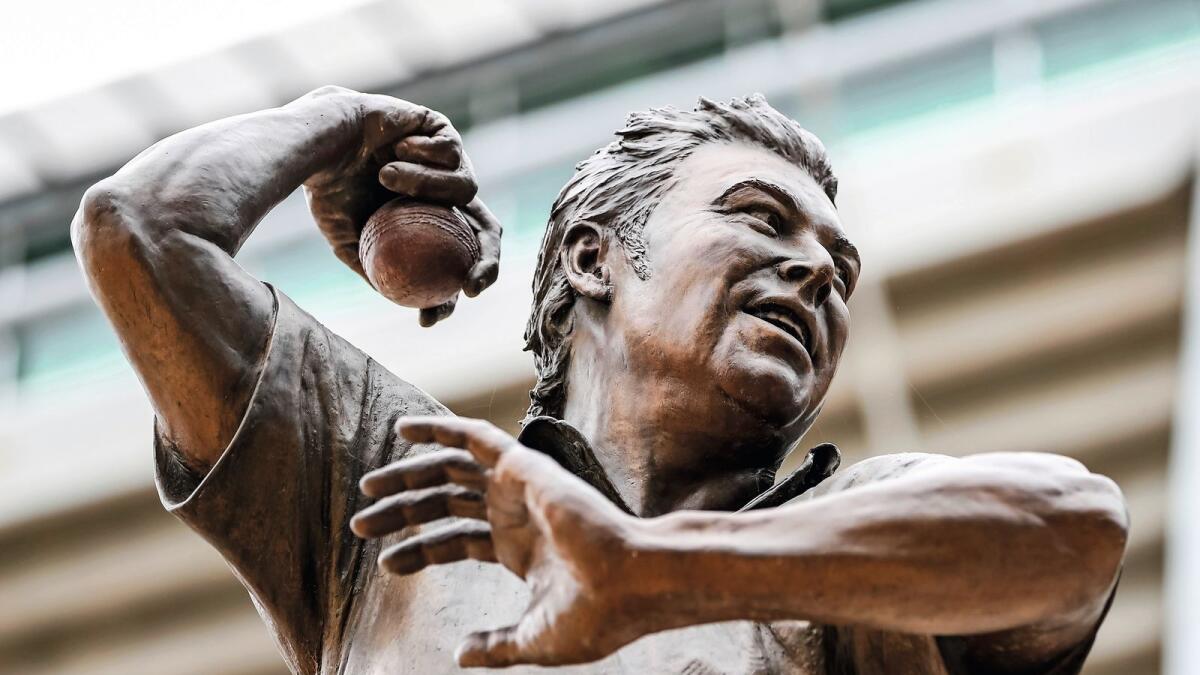 The statue of cricket legend Shane Warne stands outside the Melbourne Cricket Ground. — AP