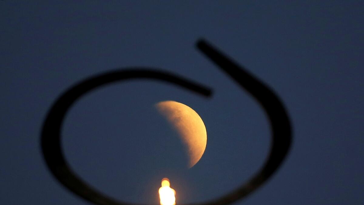 A partial lunar eclipse is seen in Brasilia, Brazil July 16, 2019. - Reuters