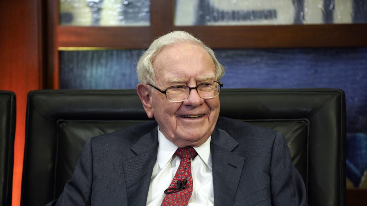 Berkshire Hathaway Chairman and CEO Warren Buffett smiles during an interview in Omaha on May 7, 2018. —AP