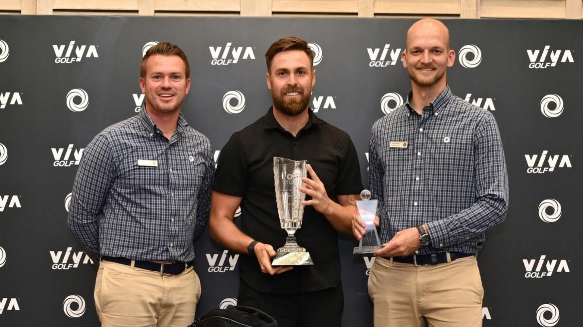 Thomas Stephenson (centre), winner of the 2024 Jumeirah Golf Estates Men's Amateur Open flanked by club officials. - Supplied photo
