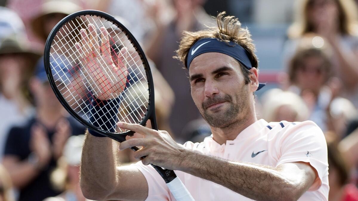 Federer flies into Montreal semis