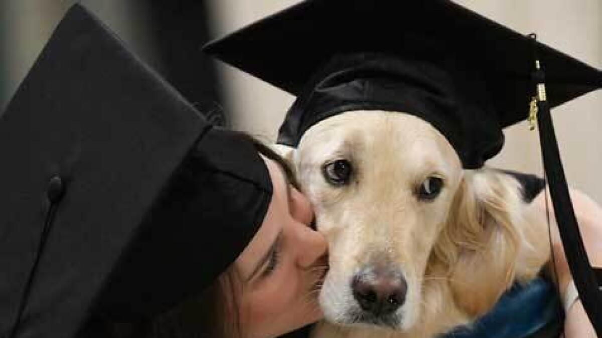 Graduates Both: Brittany Hawley and Griffin. — AP