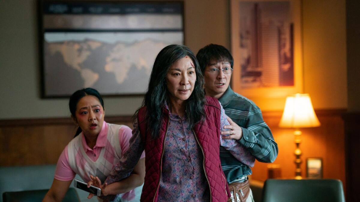 Stephanie Hsu, Michelle Yeoh and Ke Huy Quan in a scene from, 'Everything Everywhere All At Once'