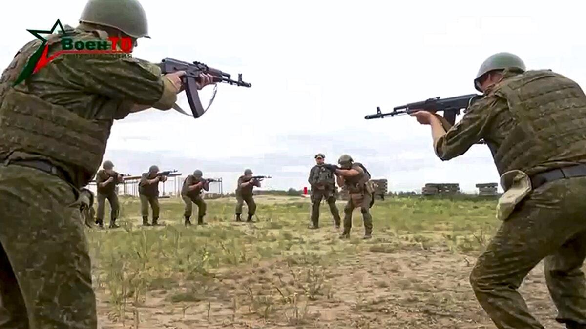 Belarusian soldiers attend a training by mercenary fighters from Wagner private military company near Tsel village, Belarus. — AP file