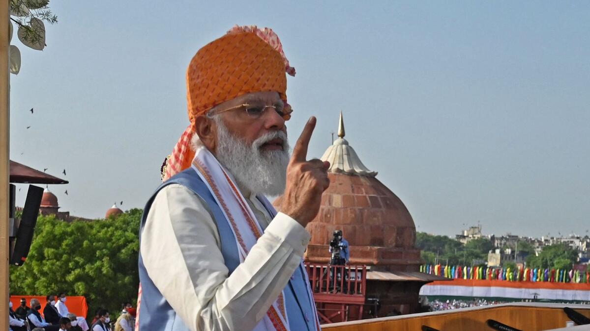 Indian Prime Minister Narendra Modi addresses the nation from the ramparts of the Red Fort during the celebrations to mark India?s 75th Independence Day in New Delhi on August 15, 2021. — AFP