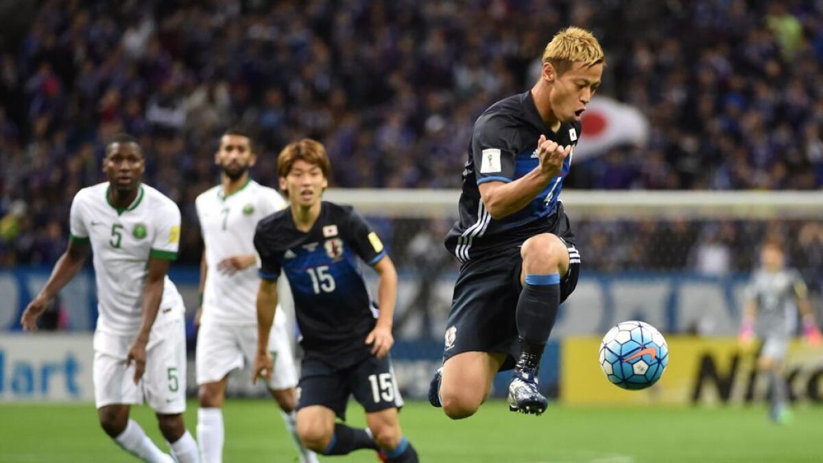 Japan win ill-tempered game; Australia survive huge scare