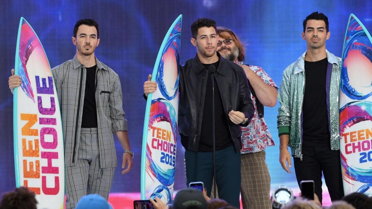 Brothers Nick, Kevin and Joe Jonas accepted the prestigious Decade Award and gave a heartfelt acceptance speech addressing bullying and how they turned adversity into strength.  AFP