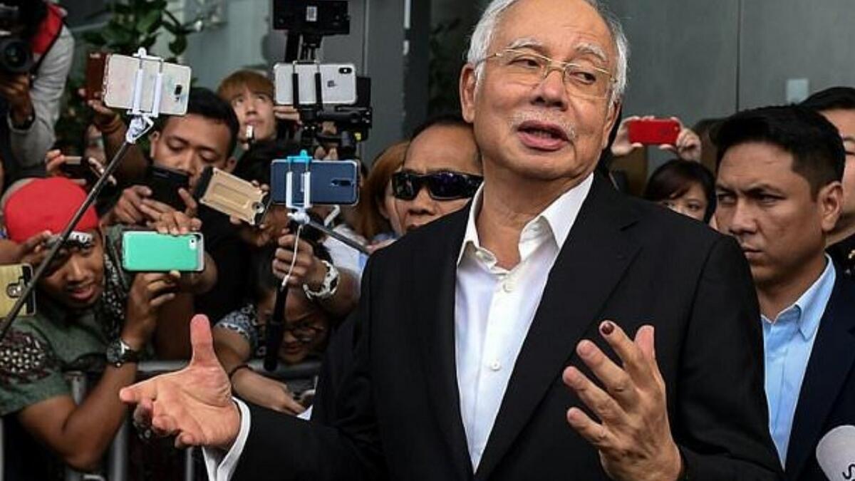 $30 million cash, 400 handbags seized in raids linked to Malaysias Najib Razak 