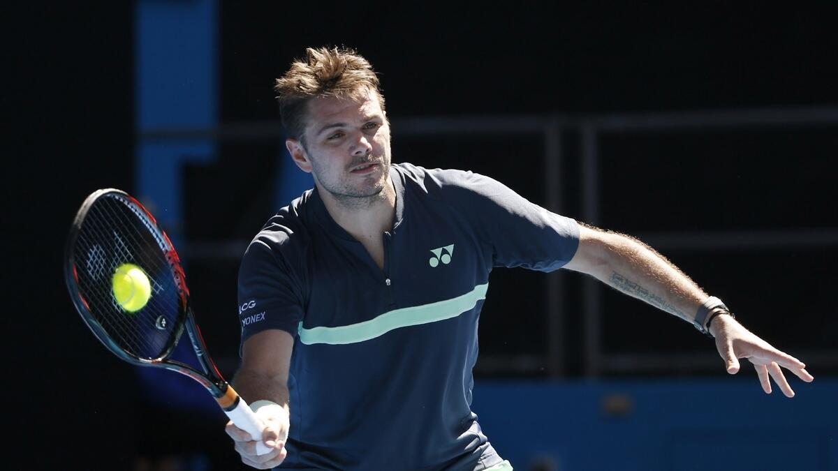 Wawrinka prevails in first match after surgery