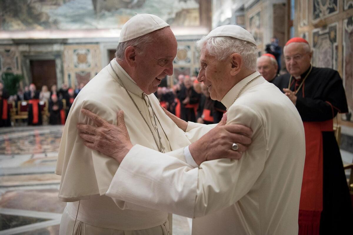 Former pope Benedict (R) is greeted by Pope Francis during a ceremony to mark his 65th anniversary of ordination to the priesthood at the Vatican June 28, 2016. (Photo: Reuters/Vatican Media)