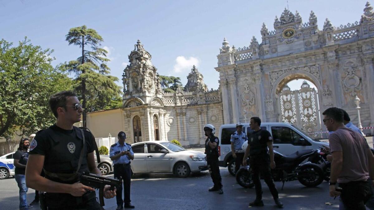 Shots fired at police guarding Istanbul palace; officer hurt
