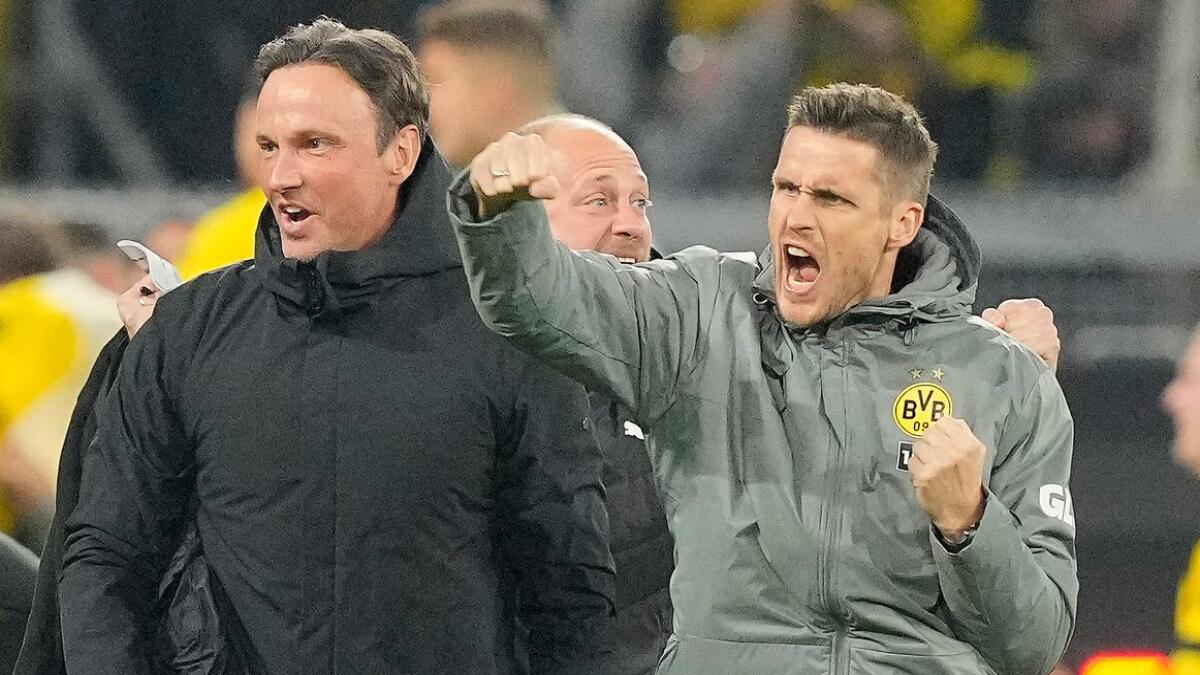 Dortmund's sporting director Sebastian Kehl (right)  is calling on his team to perform well one more time.  AP
