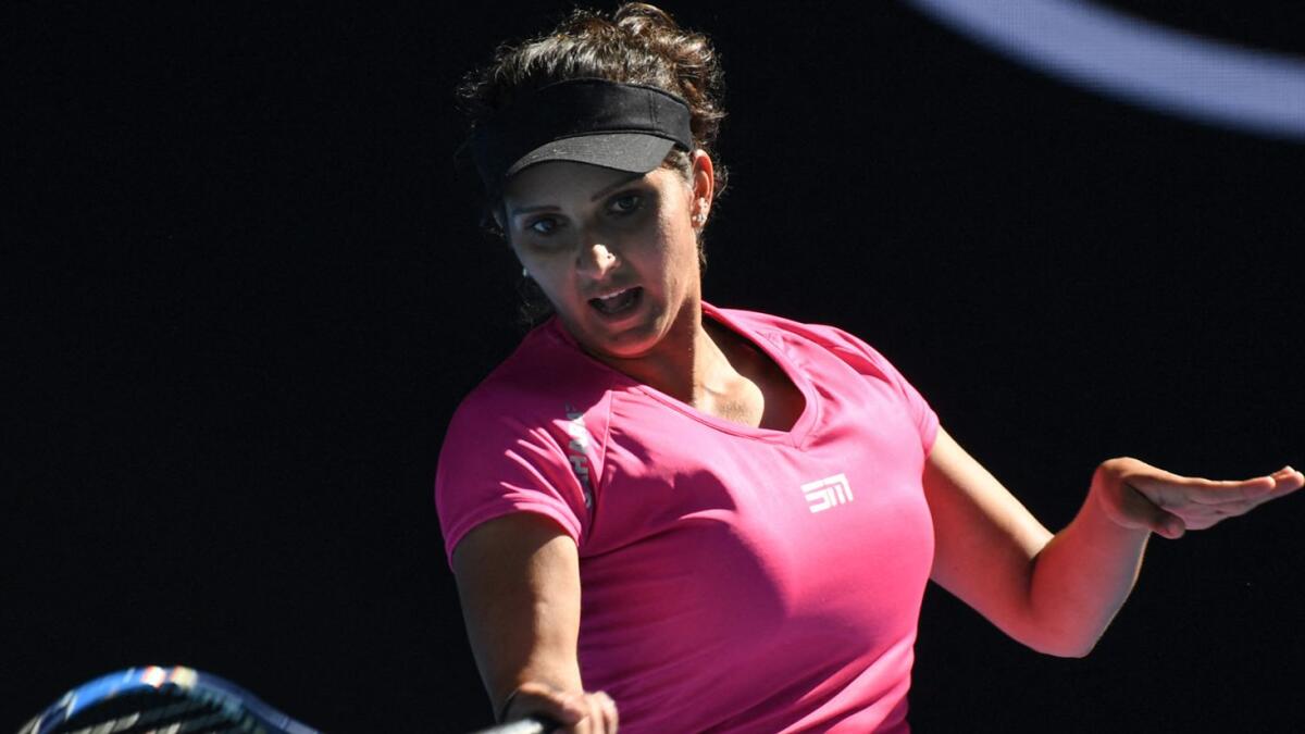 Sania Mirza suffered wrist injury which forced her to withdraw from 2008 Olympics. — AFP