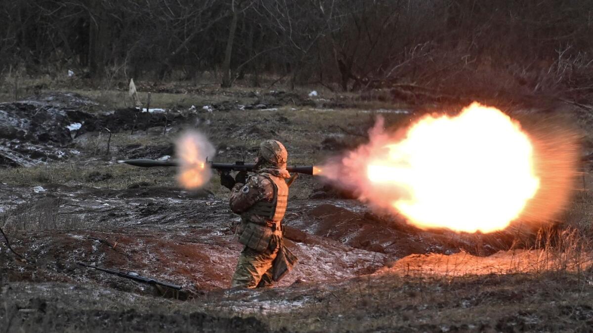A Ukrainian service member fires a RPG-7 anti-tank grenade launcher during offensive and assault drills in Zaporizhzhia Region, Ukraine. — Reuters file