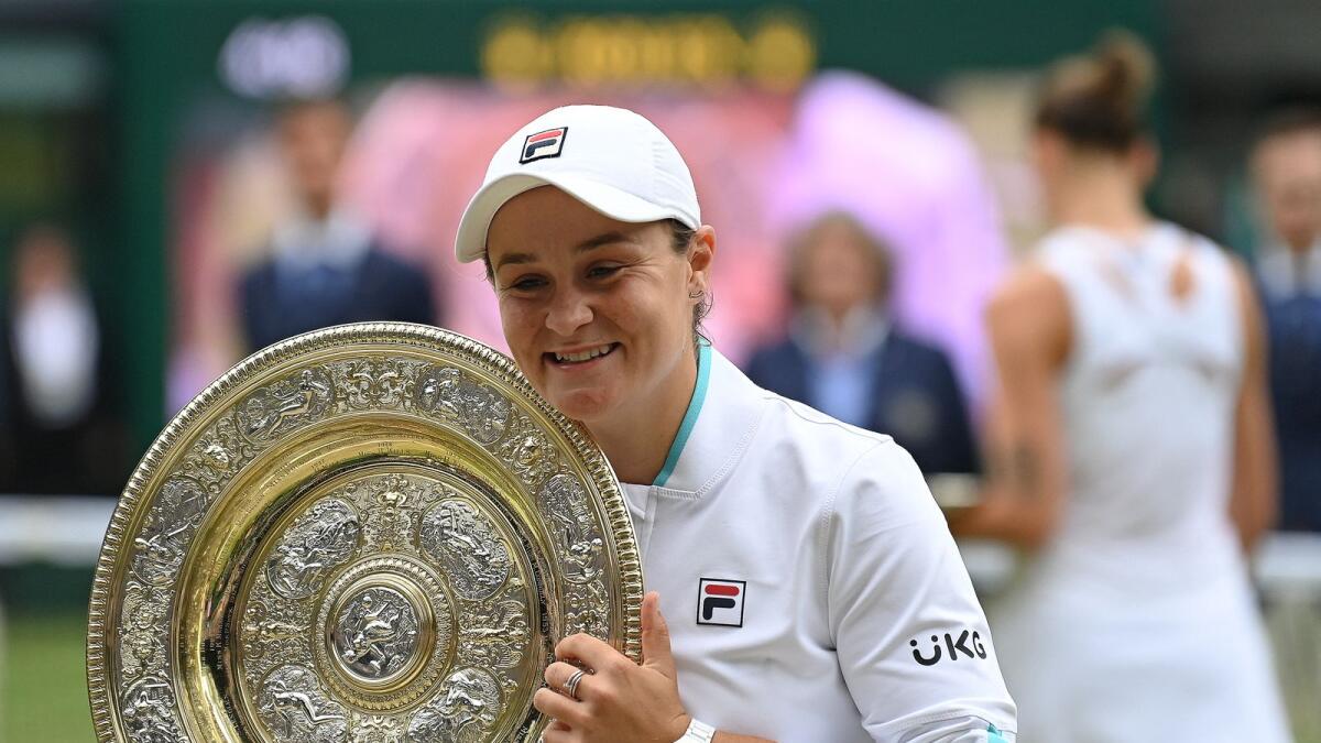 Ashleigh Barty holds the trophy after winning the women's singles title. (AFP)