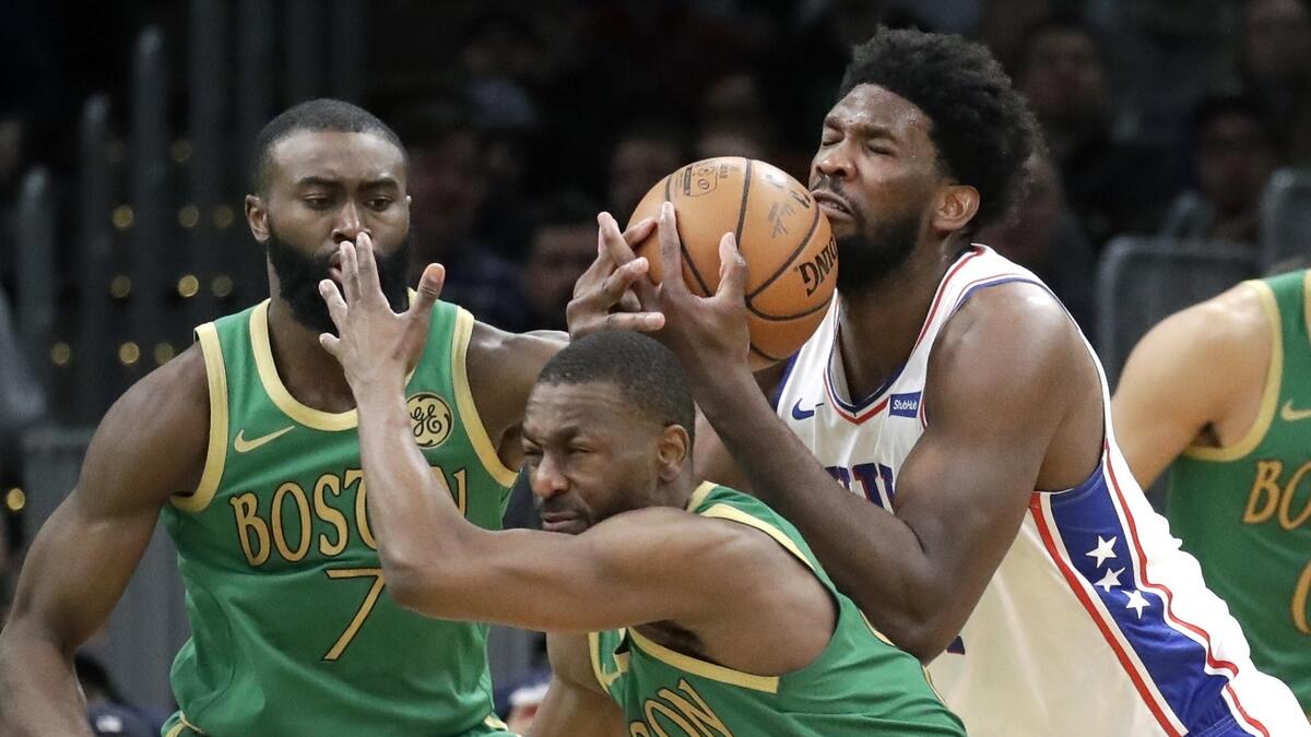 Red-hot 76ers hand Celtics first loss at home