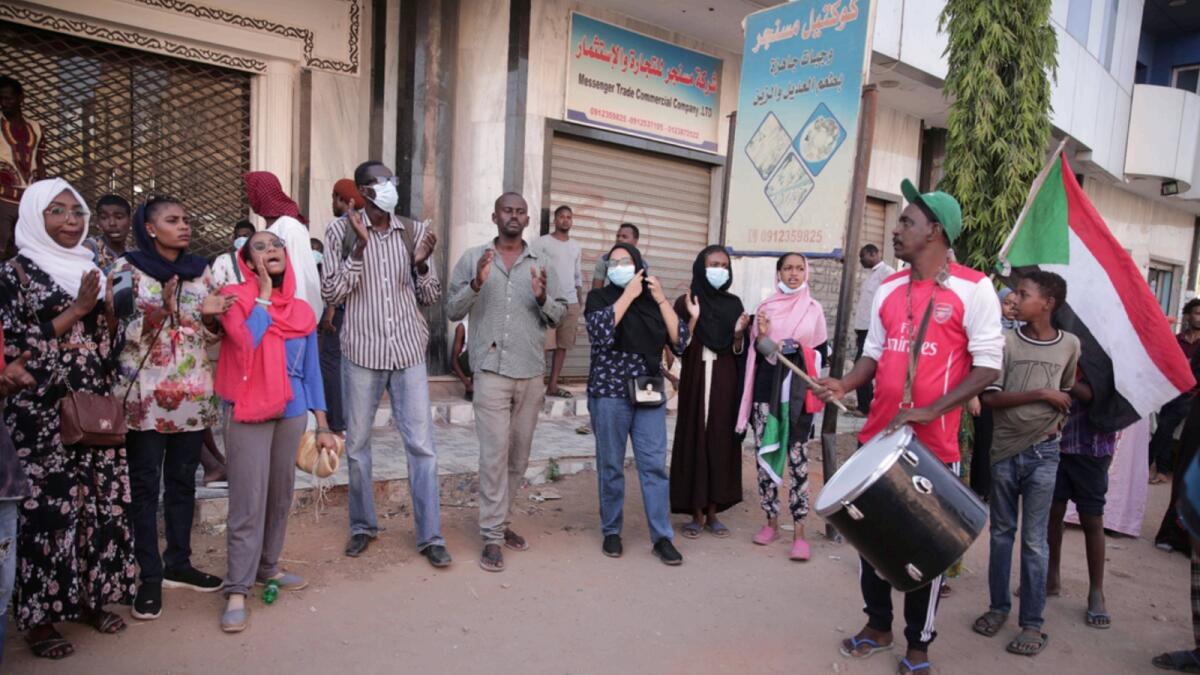 People chant slogans during a protest in Khartoum, amid ongoing demonstrations against a military takeover. — AP