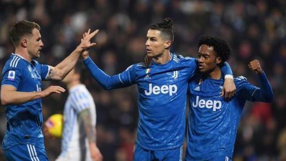 Juventus' highly-paid stars include five-time Ballon d'Or winner Cristiano Ronaldo (centre)