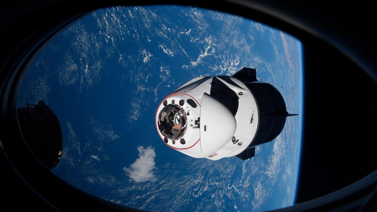 The SpaceX Crew Dragon capsule approaches the International Space Station for docking on Saturday.