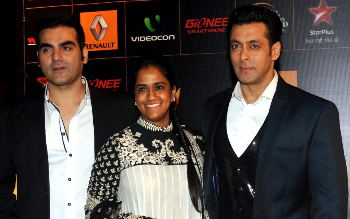 Indian Bollywood actors Arbaaz Khan (L) and Salman Khan (R), and his sister Arpita. Photo: AFP